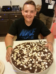 Nick making dessert at camp